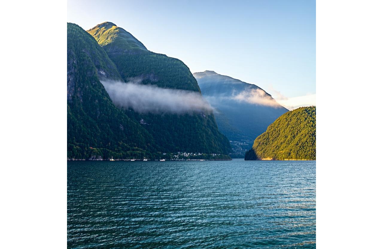 Howe Sound fjord with coastal mountains during golden hour